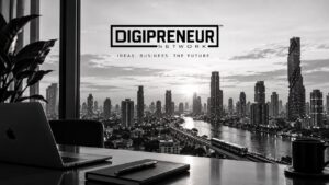 Digipreneur Network logo above a black-and-white city skyline, viewed from a desk with a laptop and notebook